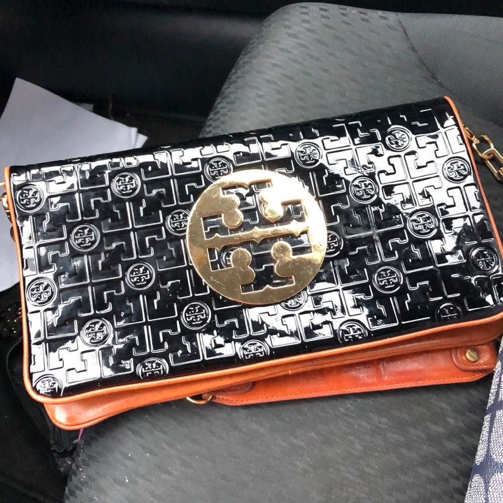 SOLD Tory burch patent clutch with logo